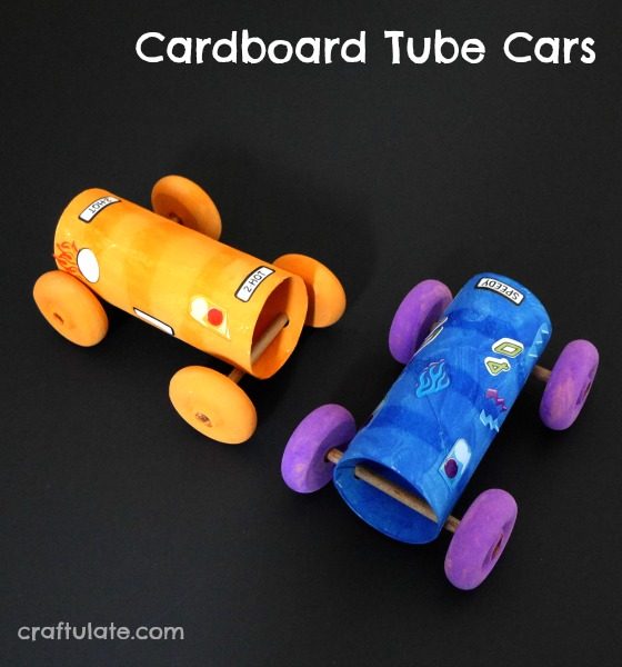 toy cars in a tube