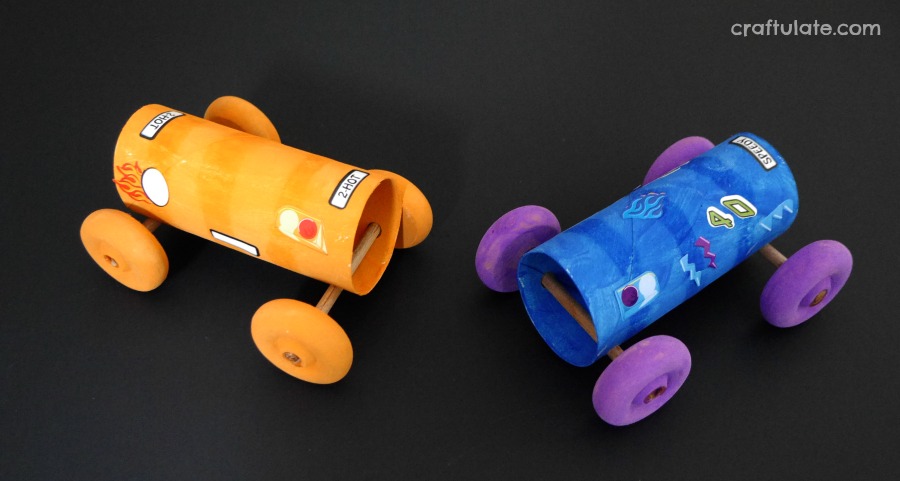 toy cars in a tube